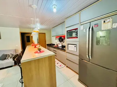 A cozinha ou kitchenette de Casa com 3 Dormitórios em Zimbros