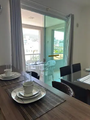 Uma área de estar em Apartanento familiar para 9 pessoas, 500 metros da praia de Bombinhas, Santa Catarina