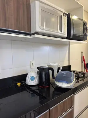 A cozinha ou kitchenette de Apartanento familiar para 9 pessoas, 500 metros da praia de Bombinhas, Santa Catarina