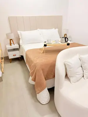 Uma cama ou camas num quarto em Studio aconchegante com vista para as montanhas