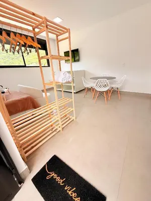 Uma cama ou camas num quarto em Studio aconchegante com vista para as montanhas