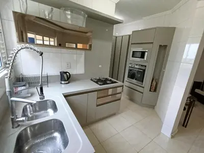 A cozinha ou kitchenette de Meia Praia Itapema Apartmento até 10 pessoas
