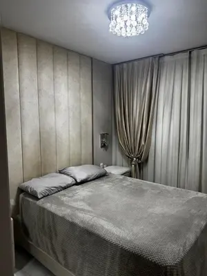 Uma cama ou camas num quarto em Apartamento Frente Mar Itapema