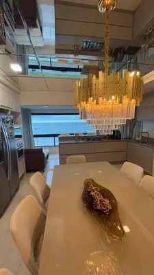 Uma área de estar em Apartamento Frente Mar Itapema