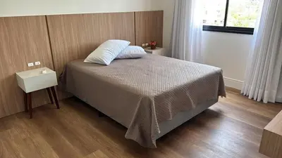 Uma cama ou camas num quarto em Beach House - Cobertura