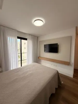 Uma cama ou camas num quarto em Beach House - Cobertura