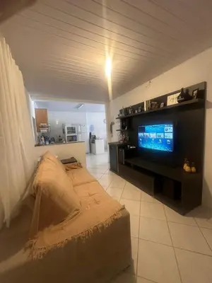 Uma televisão e/ou sistema de entretenimento em Itapema Verão