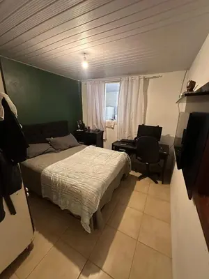 Uma cama ou camas num quarto em Itapema Verão