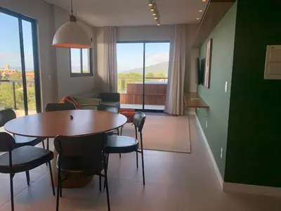Uma área de estar em Cobertura panorâmica por do sol e jacuzzi