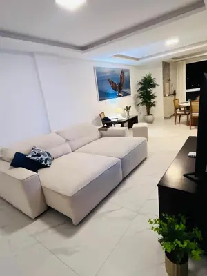 Uma área de estar em Apartamento 03 dormitório em Porto belo