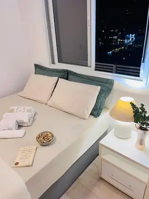 Uma cama ou camas num quarto em Apartamento 03 dormitório em Porto belo