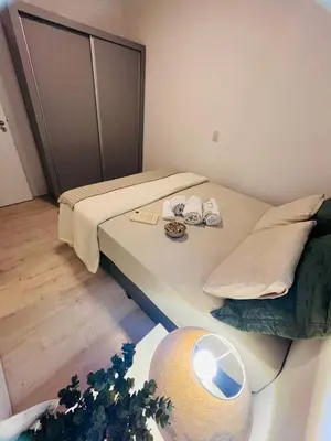 Uma cama ou camas num quarto em Apartamento 03 dormitório em Porto belo