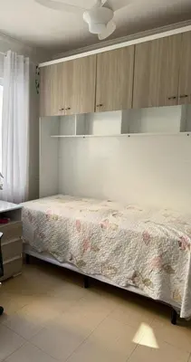Uma cama ou camas num quarto em Casa com piscina Porto Belo