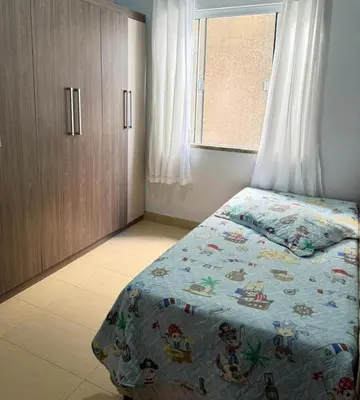 Uma cama ou camas num quarto em Casa com piscina Porto Belo