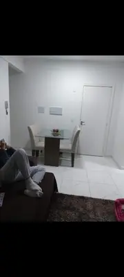 Uma área de estar em Apto aconchegante em Camboriú, para sentir-se em casa