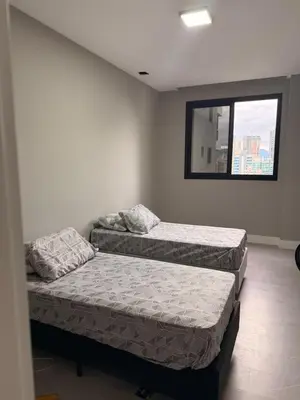 Uma cama ou camas num quarto em Apartamento de Alto Padrão com excelente localização