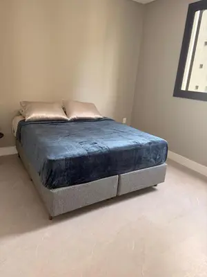 Uma cama ou camas num quarto em Apartamento de Alto Padrão com excelente localização