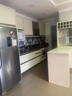 A cozinha ou kitchenette de Beautiful house on Bombas beach in Bombinhas SC