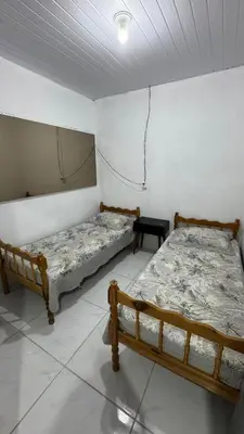 Uma cama ou camas num quarto em Casa temporada , Balneário Perequê