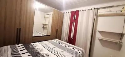 Uma cama ou camas num quarto em Bruna