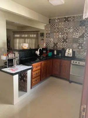 A cozinha ou kitchenette de Casa frente mar em itapema