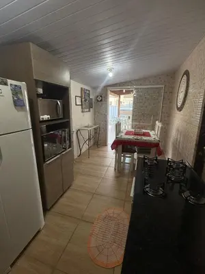 A cozinha ou kitchenette de Casa na praia próximo a Balneário Perequê Porto Belo