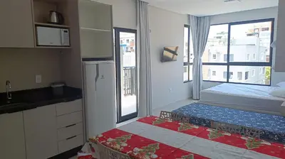 Uma cama ou camas num quarto em Praias de Bombinhas Residencial