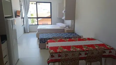 Uma cama ou camas num quarto em Praias de Bombinhas Residencial