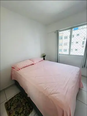 Uma cama ou camas num quarto em Apartamento Quadra Mar BC