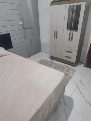 Uma cama ou camas num quarto em Andressa