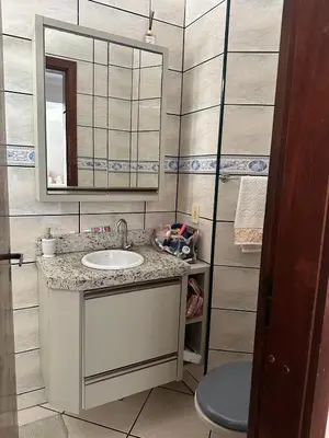 Uma casa de banho em Apartamento pé na areia!