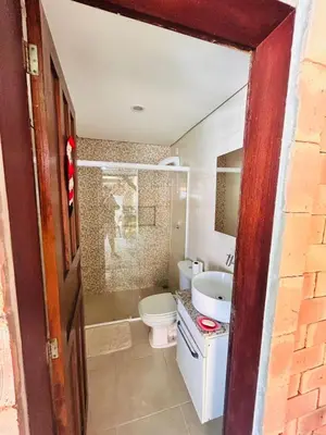 Uma casa de banho em apartamento Alamandas praia de Palmas