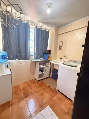 A cozinha ou kitchenette de Apartamento Amplo em Bombinhas - 100m do Mar