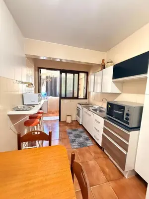 A cozinha ou kitchenette de Apartamento Amplo em Bombinhas - 100m do Mar