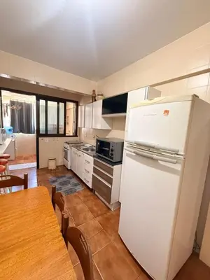 A cozinha ou kitchenette de Apartamento Amplo em Bombinhas - 100m do Mar