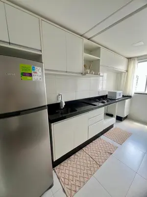 A cozinha ou kitchenette de Apartamento Rio pequeno Camboriú SC