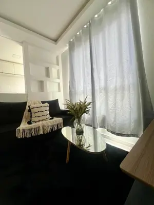 Uma área de estar em Apartamento Rio pequeno Camboriú SC