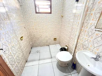 Uma casa de banho em Casa Bombinhas - 300m do Mar