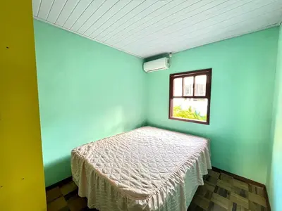 Uma cama ou camas num quarto em Casa Bombinhas - 300m do Mar