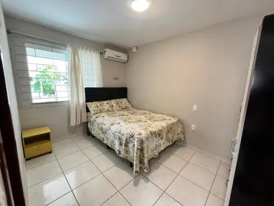 Uma cama ou camas num quarto em Casa Ampla 100m da Praia - Até 08 pessoas