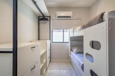 Uma cama ou camas num quarto em Apto 2 qts 350m da praia no centro BC EAN0104