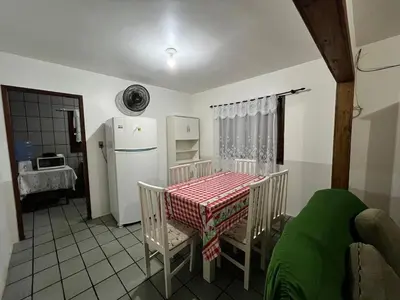 Uma área de estar em Casa completa - 350m da Praia 10 pessoas