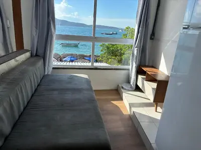 Uma área de estar em Brisa Mar Praia da Lagoinha - Residencial Pé na areia