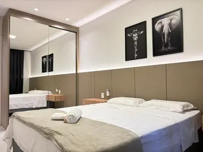 Uma cama ou camas num quarto em Apto Novo ao Lado do Hard Rock - 3 Quartos 2 Vagas
