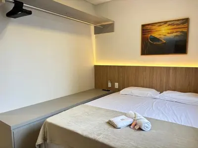 Uma cama ou camas num quarto em Apto Novo ao Lado do Hard Rock - 3 Quartos 2 Vagas
