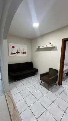 Uma área de estar em Aluguel Casa no Centro Bombinhas