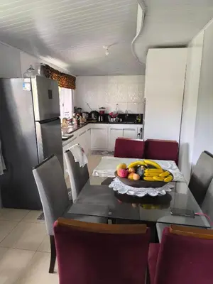 A cozinha ou kitchenette de casa da isa