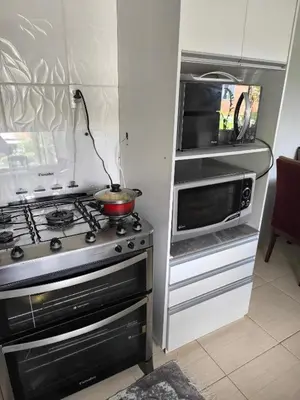 A cozinha ou kitchenette de casa da isa