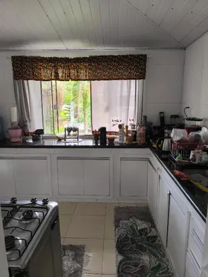 A cozinha ou kitchenette de casa da isa