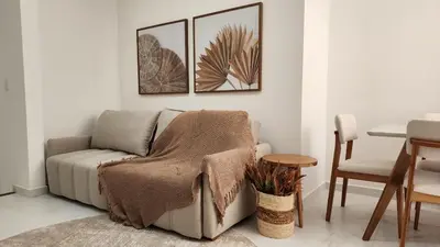Uma área de estar em Cobertura Duplex na Praia de Canto Grande